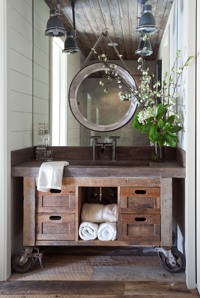 Inspiration for a country bathroom in Denver with dark wood cabinets, white walls, dark hardwood floors, an integrated sink and shaker cabinets.