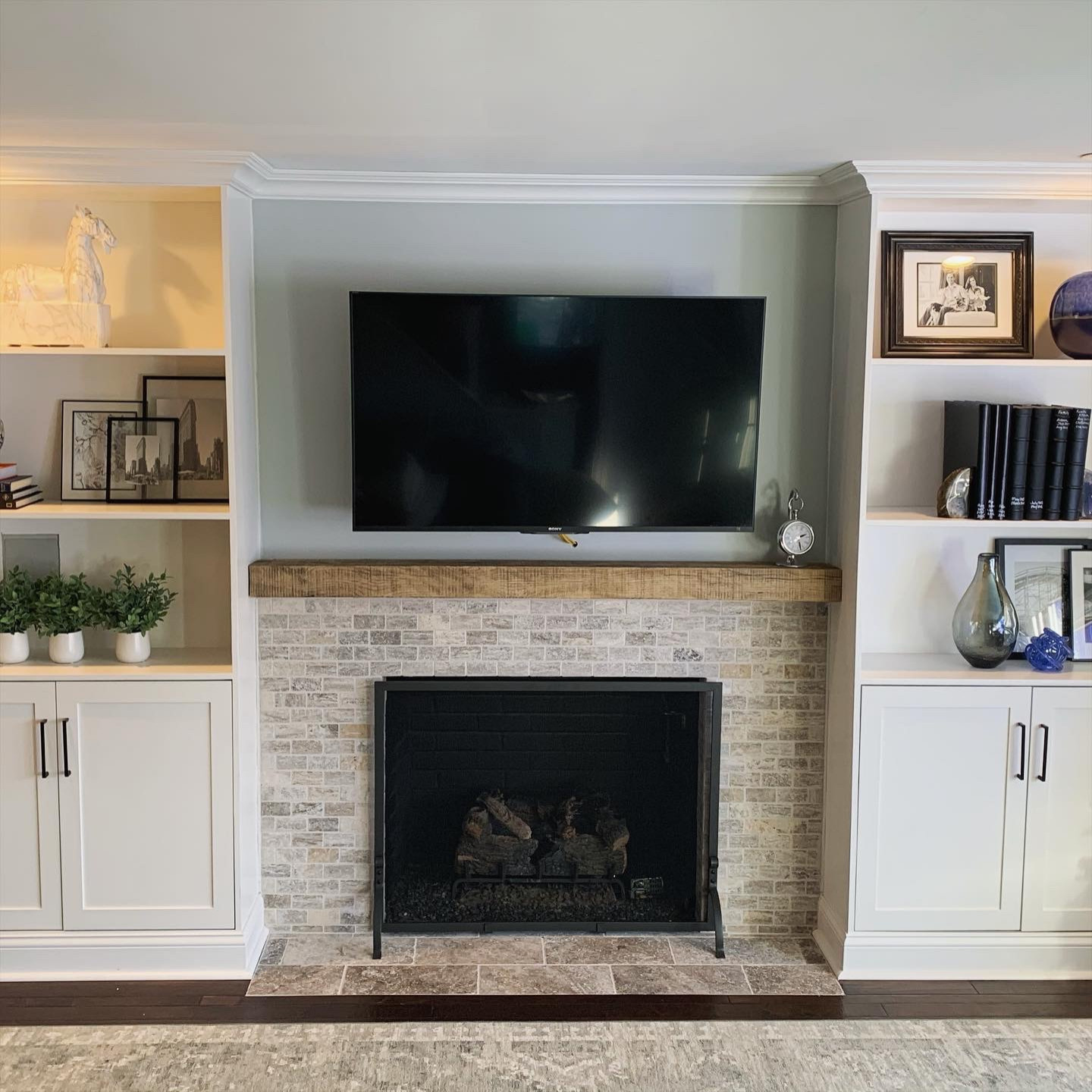 Custom built in bookcase/fireplace and hearth area