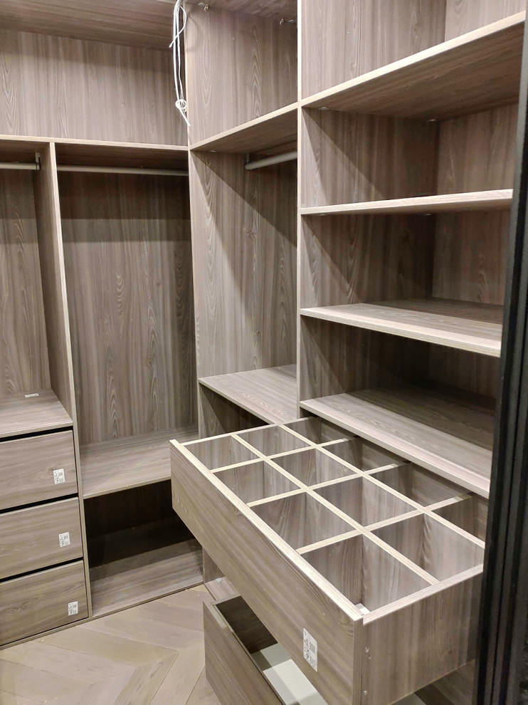 Photo of a large scandinavian storage and wardrobe in Moscow.