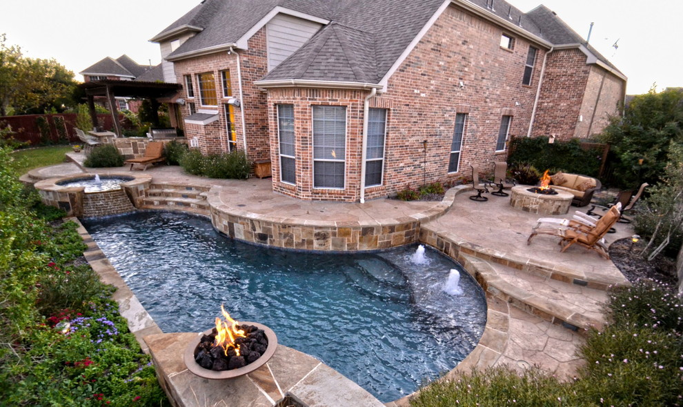 Small contemporary backyard custom-shaped pool in Dallas with a water feature and stamped concrete.