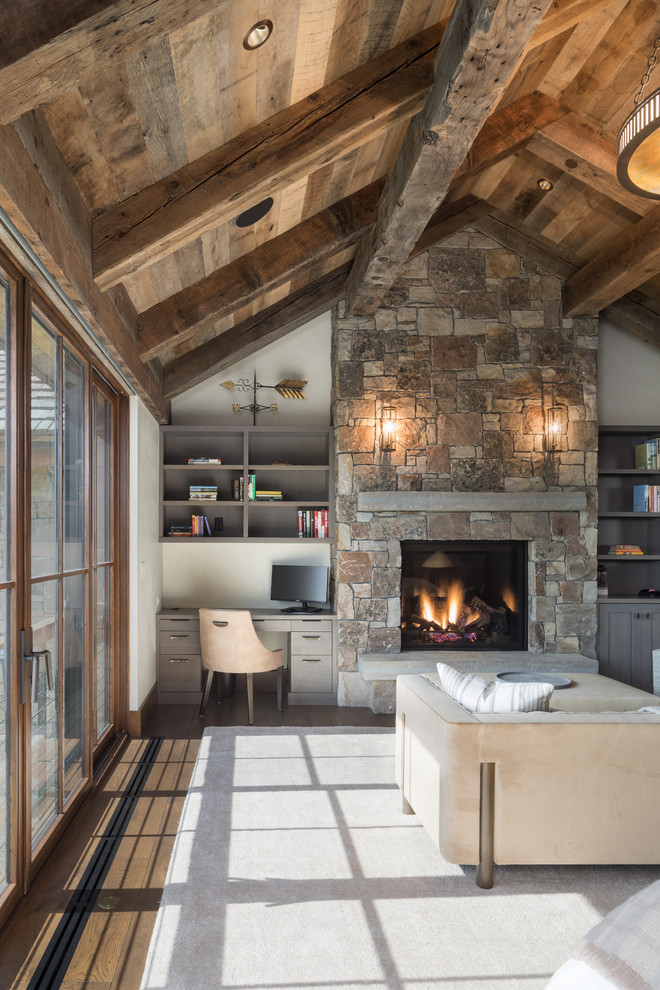 Example of a mountain style bedroom design in Jackson