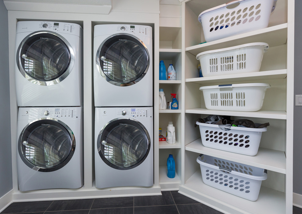 Example of a transitional laundry room design in Cedar Rapids
