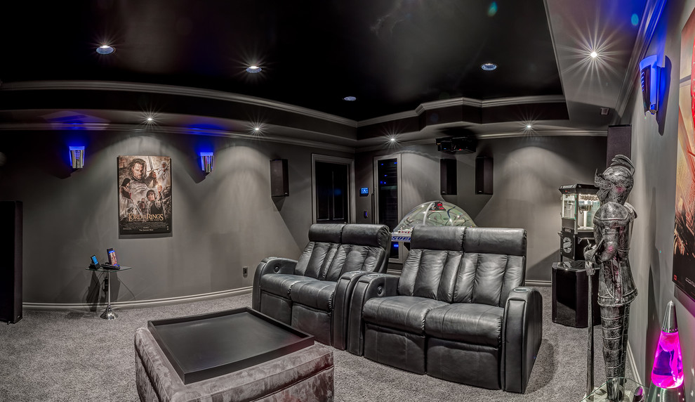 Inspiration for a large contemporary enclosed home theatre in Calgary with grey walls, carpet and a projector screen.
