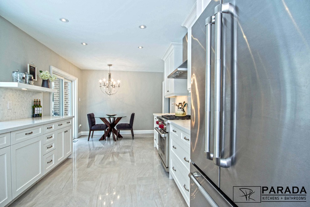 Example of a transitional kitchen design in Toronto