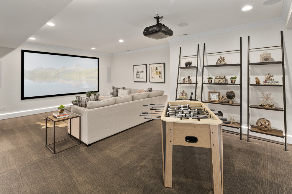 Inspiration for a large transitional open concept home theatre in Seattle with white walls, carpet, a projector screen and grey floor.