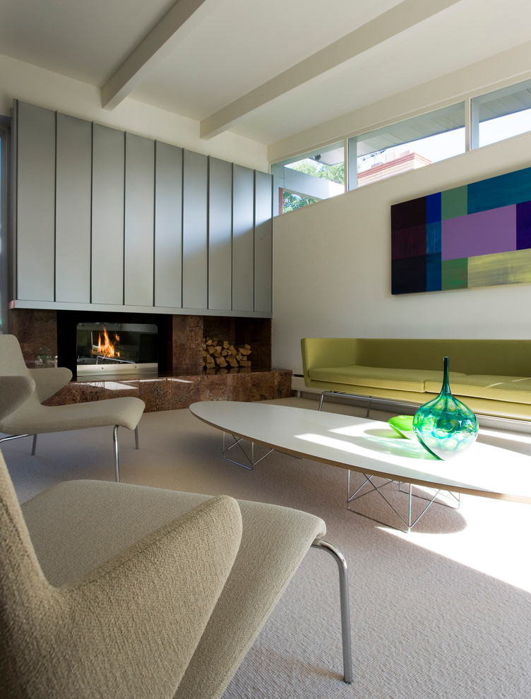 Modern living room in Denver with white walls.