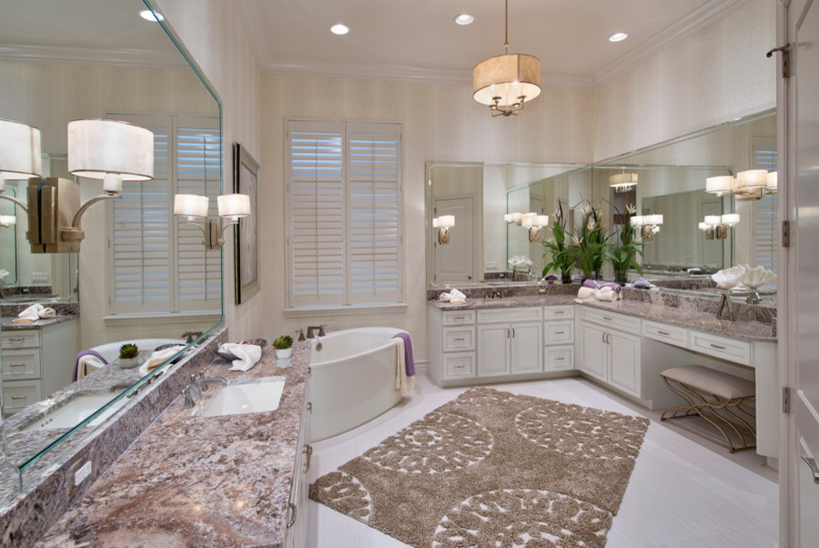 Inspiration for a large transitional master white tile and ceramic tile ceramic tile freestanding bathtub remodel with louvered cabinets, white cabinets, beige walls, a drop-in sink and granite countertops