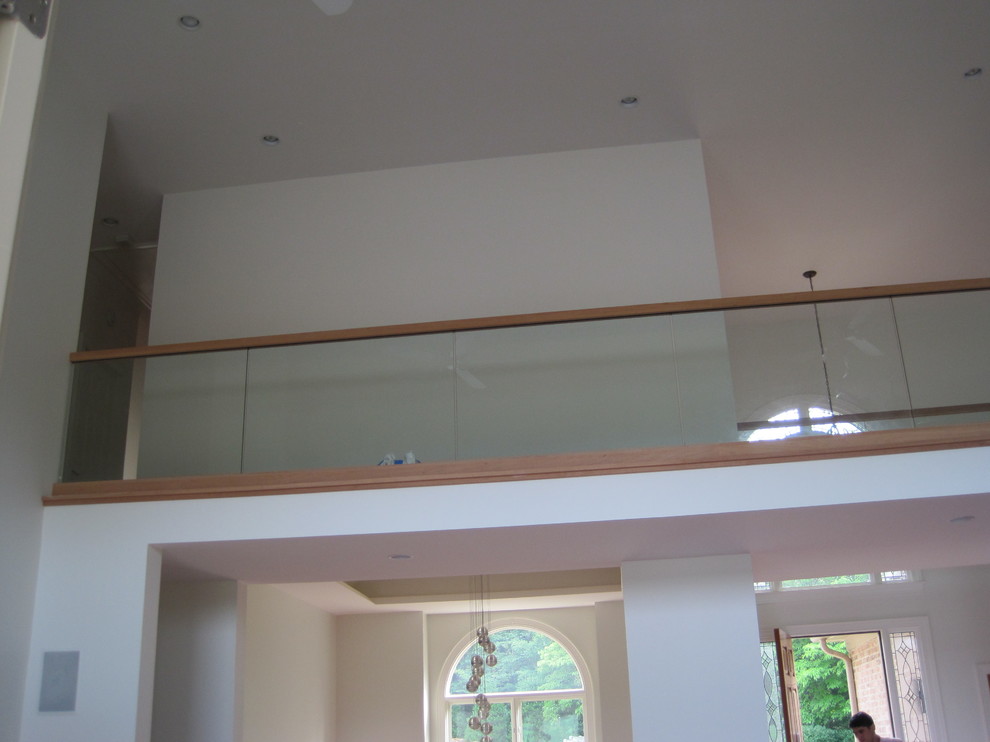 Large minimalist straight staircase photo in Charlotte