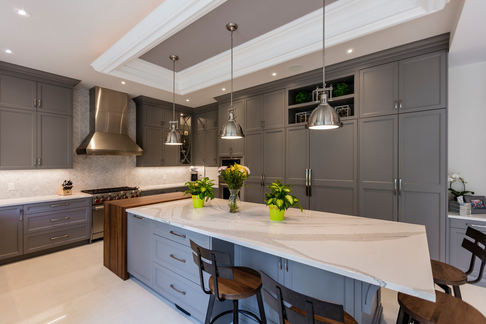 Example of a transitional kitchen design in Toronto