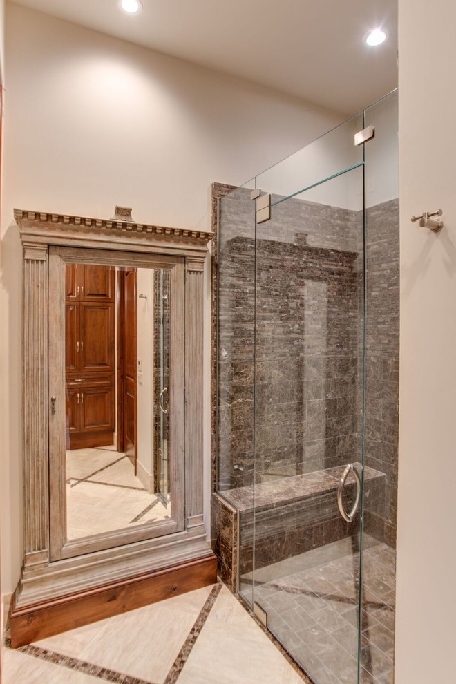 Large traditional master bathroom with beaded inset cabinets, medium wood cabinets, a one-piece toilet, stone tile, beige walls, an undermount sink, marble benchtops, an undermount tub, a curbless shower, beige tile, marble floors, beige floor and a hinged shower door.