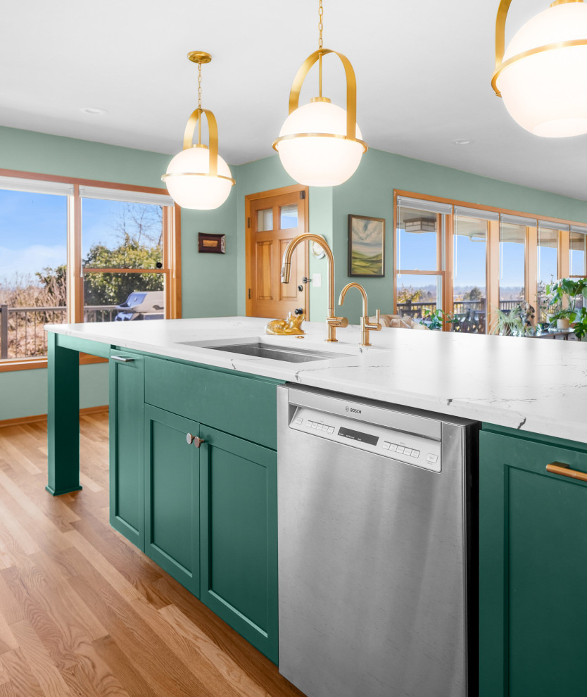 Inspiration for a transitional l-shaped medium tone wood floor kitchen remodel with shaker cabinets, white backsplash, an island and white countertops