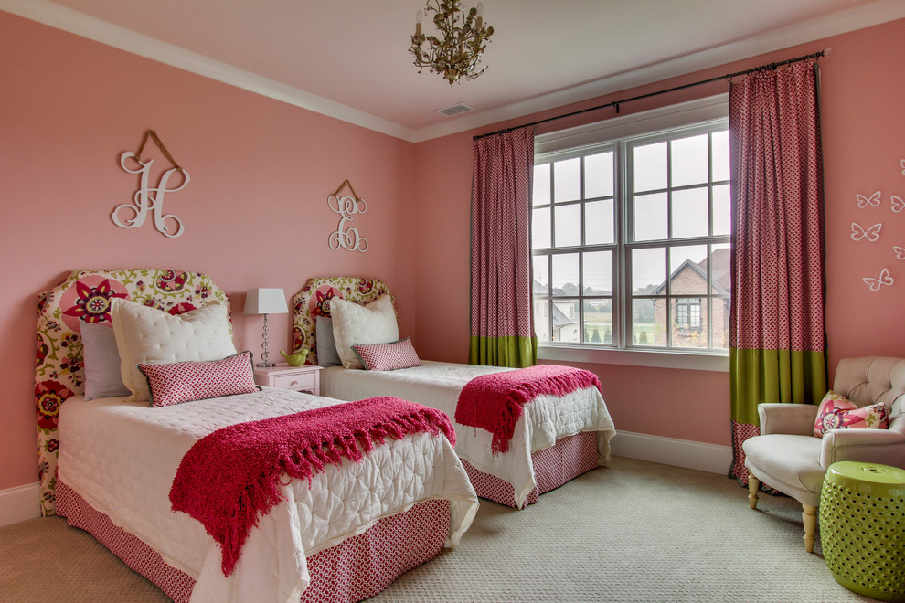 Design ideas for a mid-sized traditional kids' bedroom for kids 4-10 years old and girls in Nashville with pink walls and carpet.
