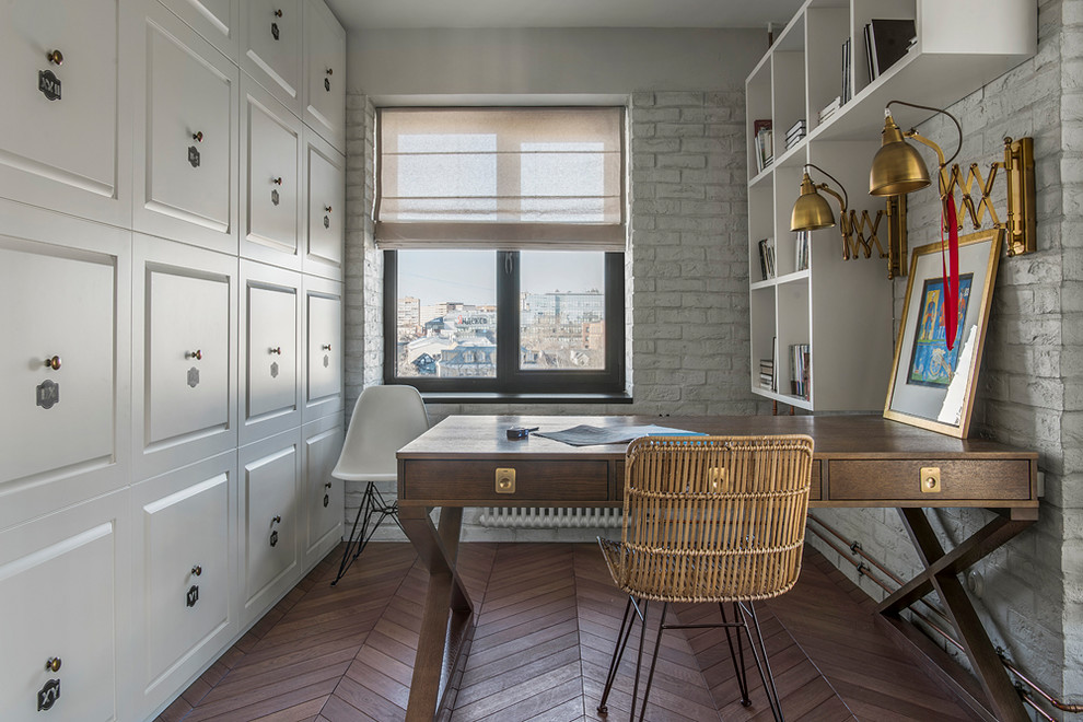 This is an example of a contemporary kids' study room in Moscow with grey walls, medium hardwood floors and brown floor.