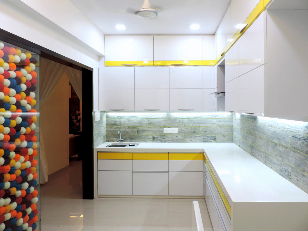 This is an example of an asian kitchen in Mumbai.