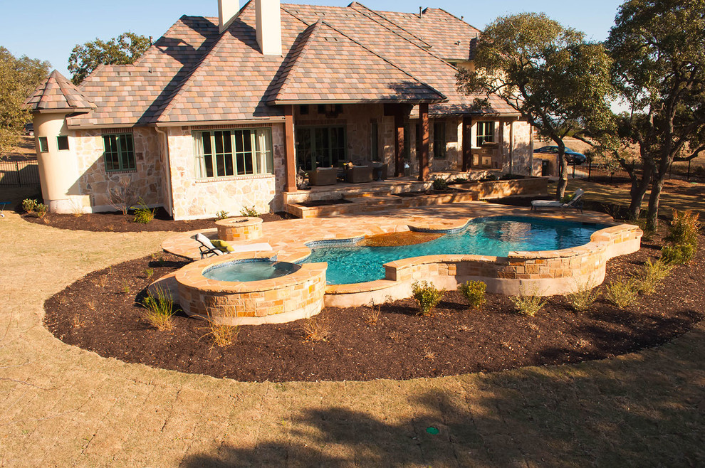 Mountain style home design photo in Austin