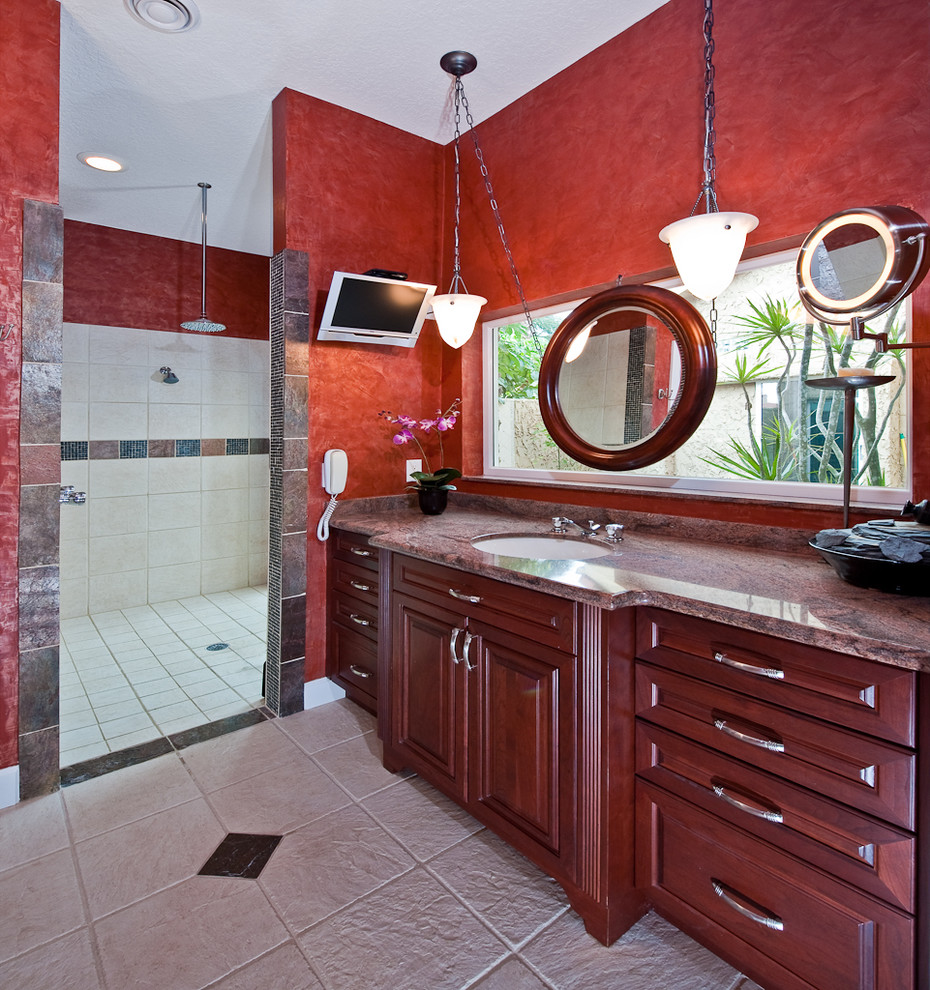 Photo of a traditional bathroom in Tampa with granite benchtops.