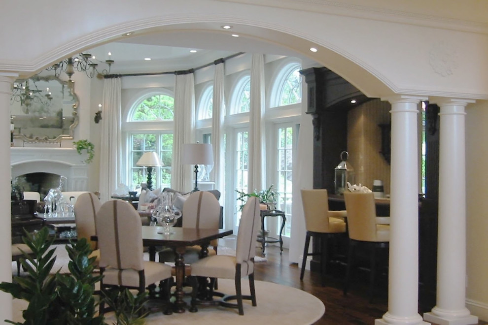 Inspiration for a large traditional foyer in Boston with white walls, limestone floors and beige floor.