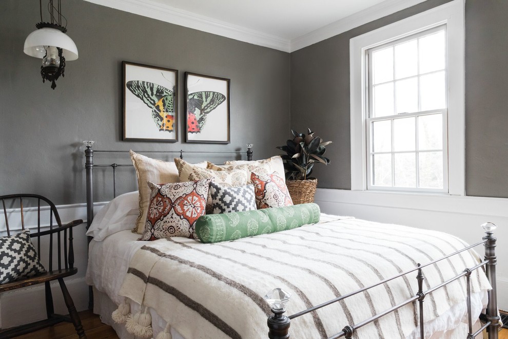 Design ideas for a beach style bedroom in Boston with grey walls.
