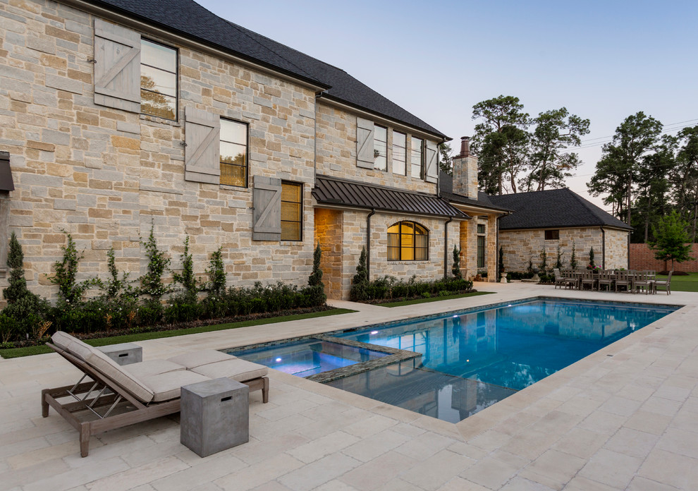 Design ideas for a country backyard rectangular pool in Houston with a hot tub.