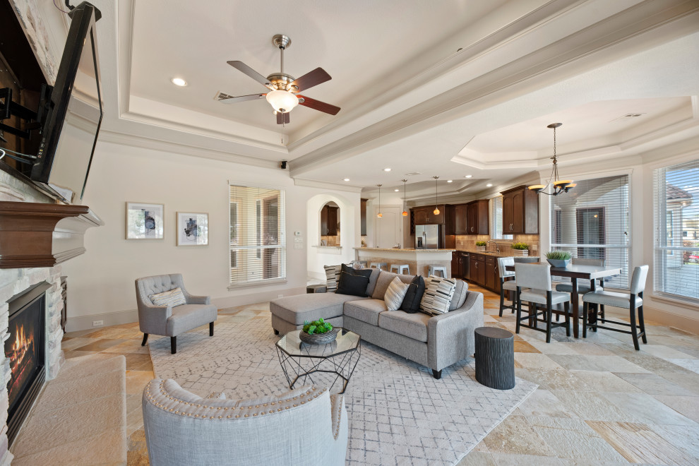 Photo of an expansive mediterranean games room in Houston with slate flooring and a drop ceiling.