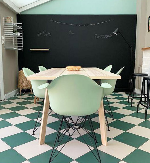 Example of a mid-sized minimalist ceramic tile and turquoise floor dining room design in Lille