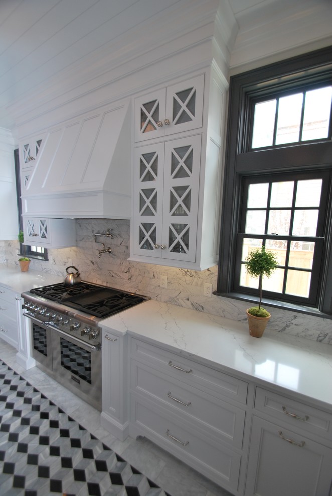 Inspiration for a large transitional u-shaped separate kitchen in DC Metro with beaded inset cabinets, white cabinets, quartz benchtops, grey splashback, marble splashback, stainless steel appliances, marble floors, with island, multi-coloured floor and white benchtop.