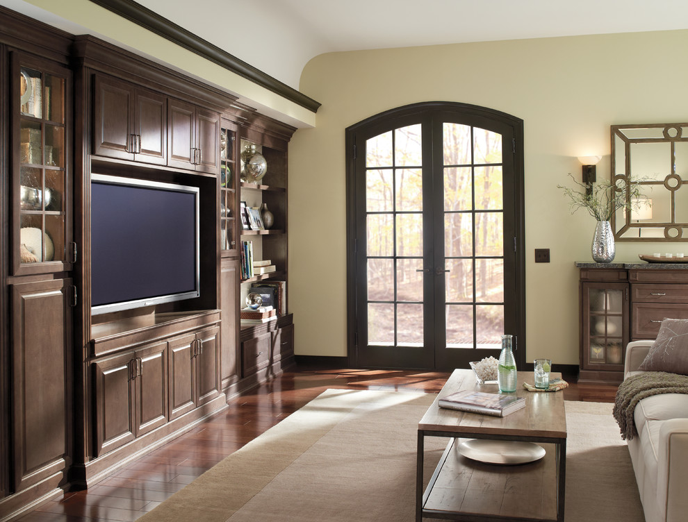 Design ideas for a mid-sized traditional open concept family room in Detroit with beige walls, medium hardwood floors and a built-in media wall.