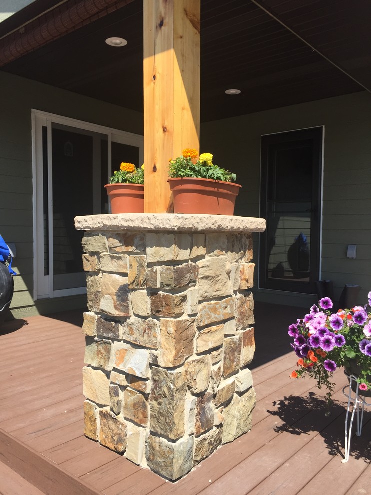 Patio - rustic front yard patio idea with a roof extension