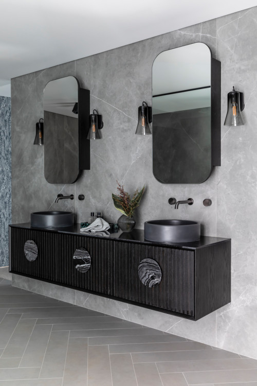 Striking Contrast: Black Vanity and Gray Herringbone Tiles for Bathroom Vanity Lighting Fixtures