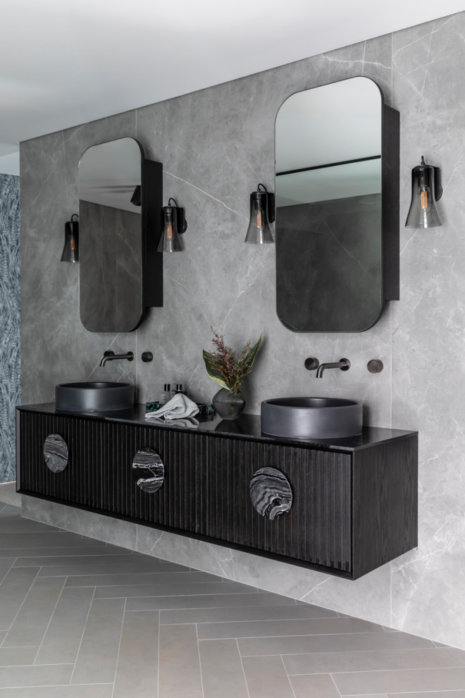 This is an example of a large contemporary master bathroom in Sydney with a floating vanity.