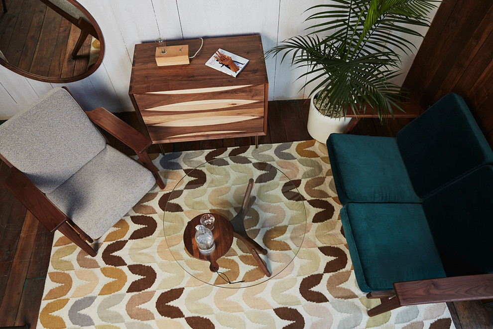 Inspiration for a small 1960s formal and enclosed dark wood floor and brown floor living room remodel in San Diego with white walls, no fireplace and no tv
