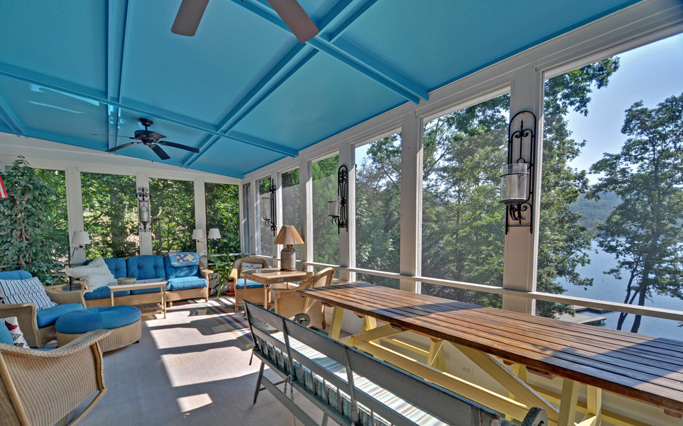 Beach style verandah in Atlanta with a roof extension.