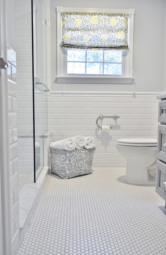 Small traditional master bathroom in Philadelphia with recessed-panel cabinets, marble benchtops, an alcove shower, white tile, porcelain tile, grey walls and mosaic tile floors.