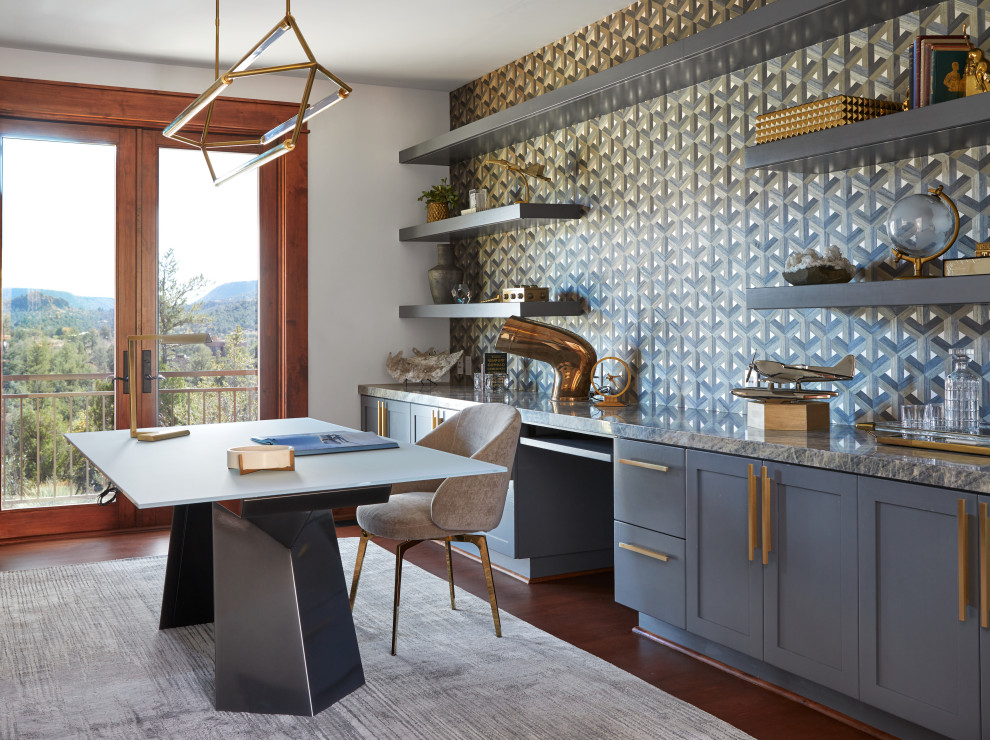 Example of a southwest home office design in Phoenix