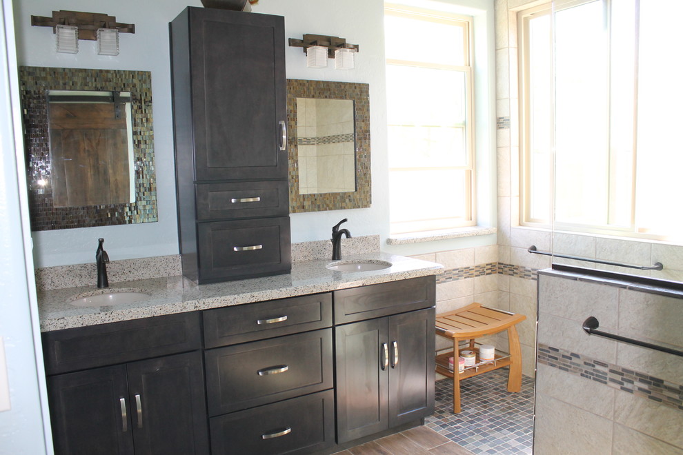 Walk-in shower - mid-sized transitional master beige tile and porcelain tile porcelain tile and brown floor walk-in shower idea in Phoenix with flat-panel cabinets, gray cabinets, a two-piece toilet, blue walls, quartzite countertops and an undermount sink