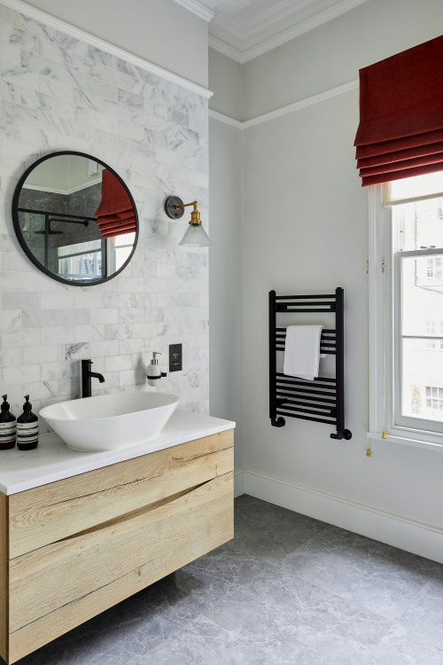 Modern Marble Subway Tile Backsplash and Light Wood Vanity with Red Window Shades