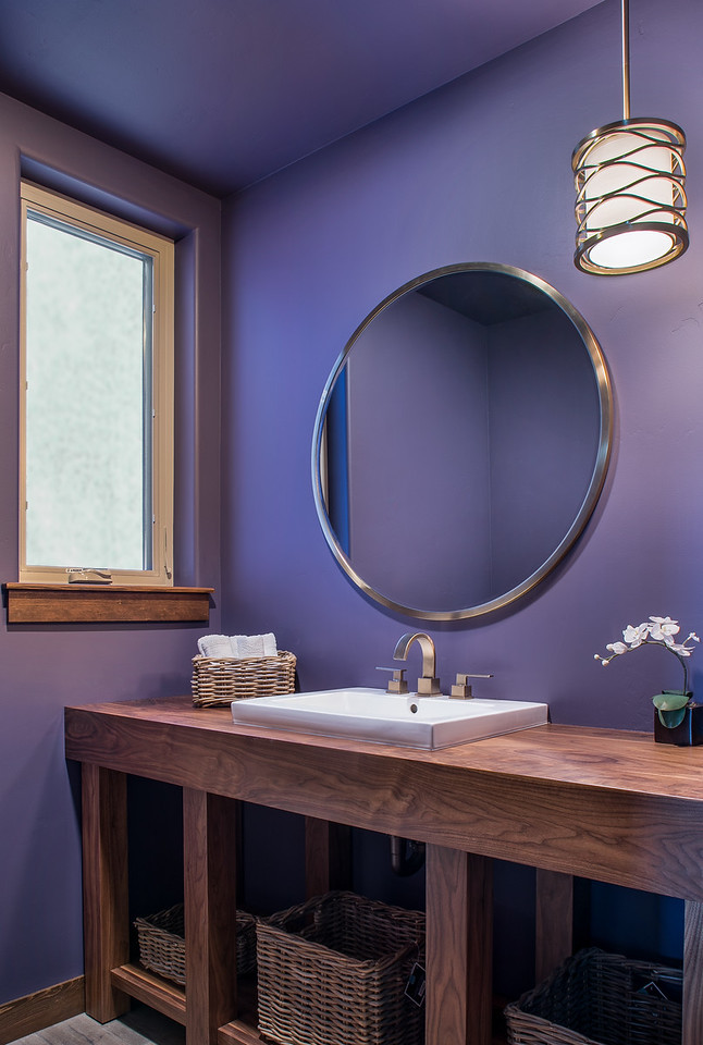 Small transitional bathroom in Seattle with open cabinets, medium wood cabinets, purple walls, vinyl floors, a vessel sink and wood benchtops.