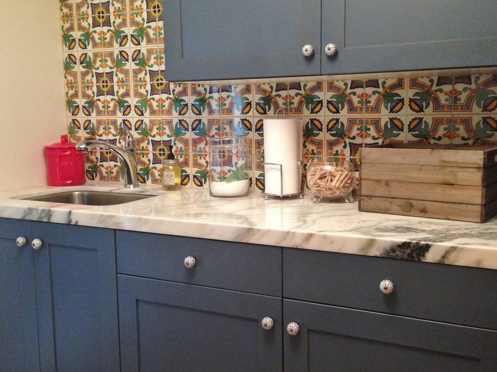 Home design - mid-sized eclectic home design idea in Phoenix