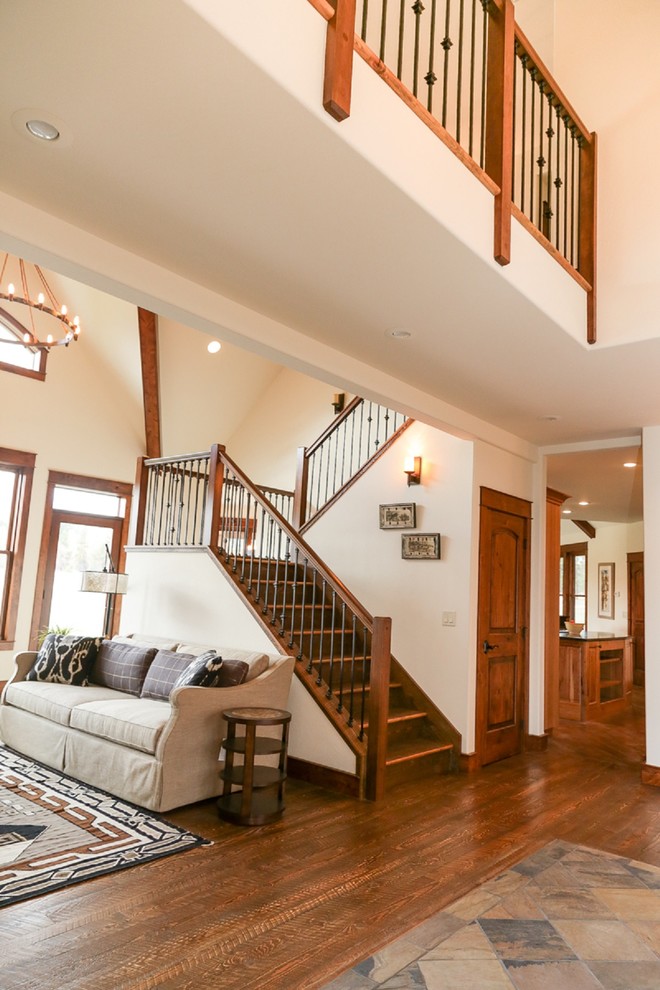 Inspiration for a mid-sized arts and crafts wood u-shaped staircase in Other with wood risers and mixed railing.