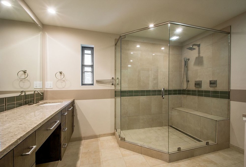 Mid-sized contemporary master bathroom in Dallas with flat-panel cabinets, dark wood cabinets, glass tile, beige walls, travertine floors, an undermount sink, granite benchtops, a corner shower, beige tile, brown tile, green tile, beige floor and a hinged shower door.