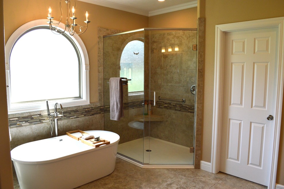 Mid-sized elegant master brown tile and ceramic tile ceramic tile and beige floor freestanding bathtub photo with brown walls, a hinged shower door and gray countertops