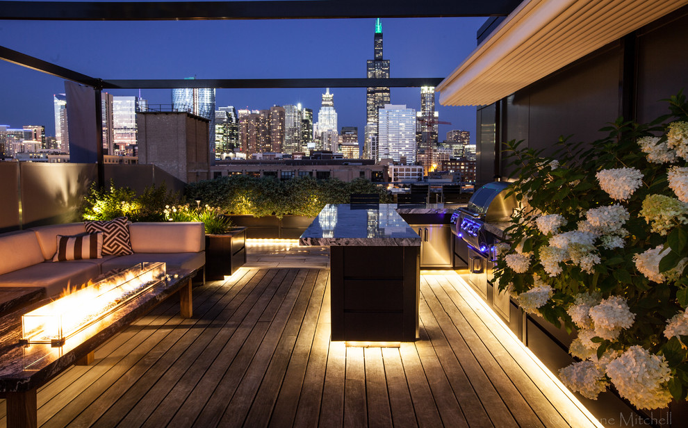 Inspiration for a modern rooftop deck remodel in Chicago with a fire pit