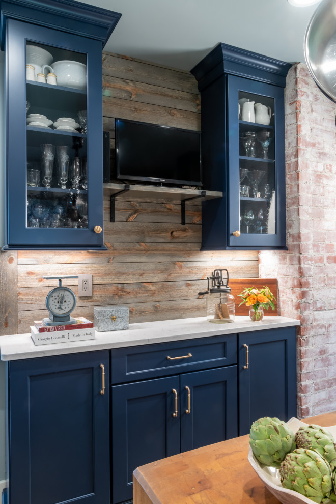 Design ideas for a traditional home bar in St Louis with shaker cabinets, blue cabinets, quartz benchtops and white benchtop.