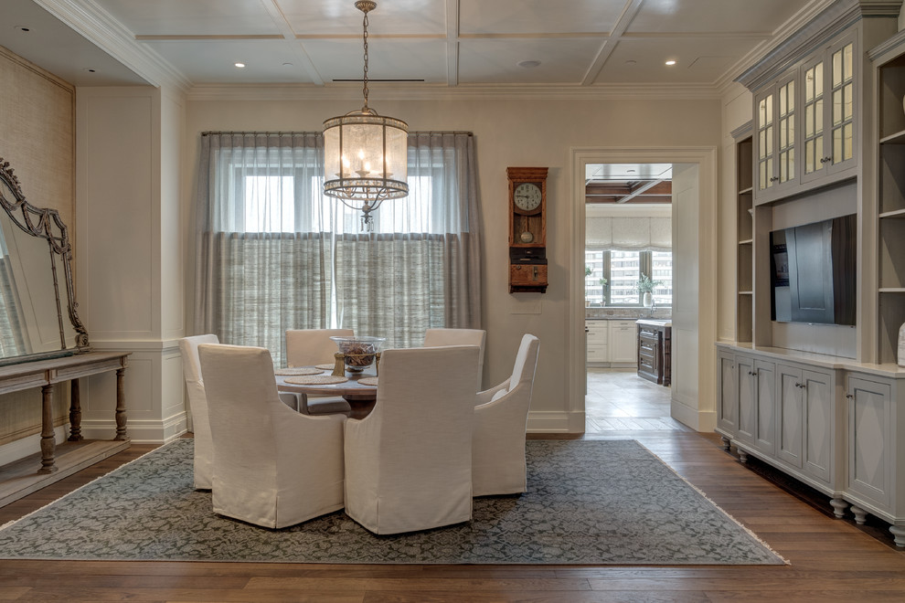 Photo of a large traditional separate dining room in Philadelphia with beige walls, medium hardwood floors and no fireplace.
