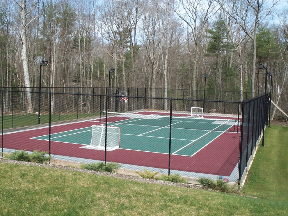 Design ideas for a large traditional backyard partial sun outdoor sport court in Boston with concrete pavers.