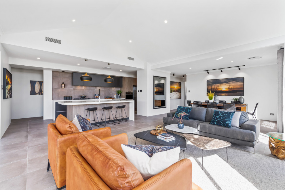 Design ideas for a contemporary open concept living room in Perth with white walls and grey floor.