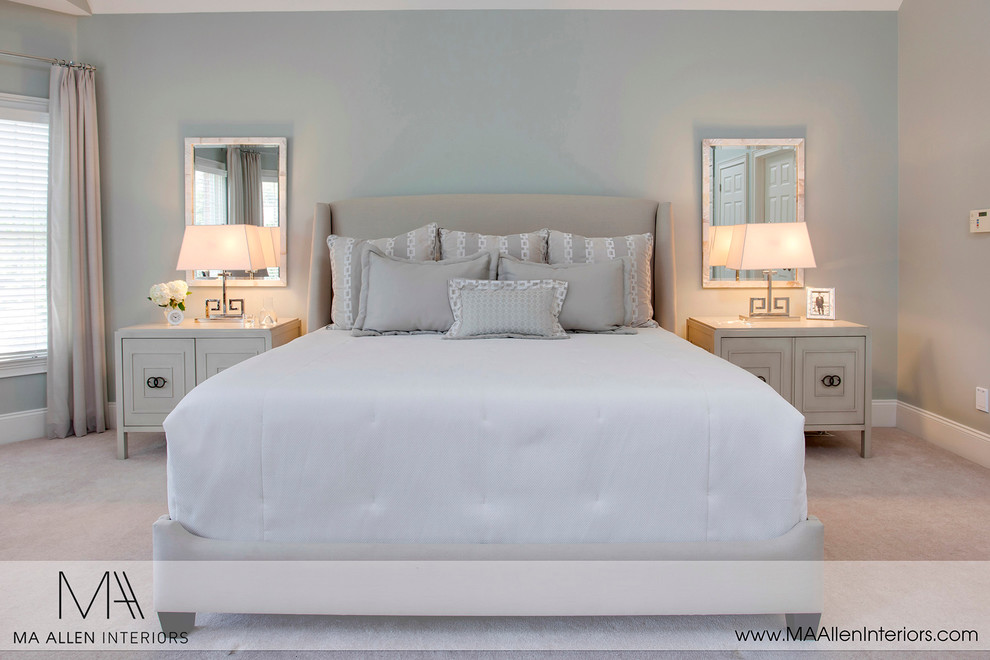 This is an example of a transitional bedroom in Raleigh.