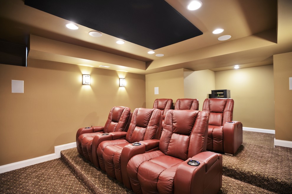 Arts and crafts home theatre in Baltimore with beige walls and carpet.