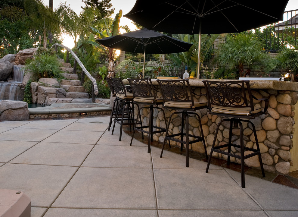 Photo of a tropical patio in Orange County.