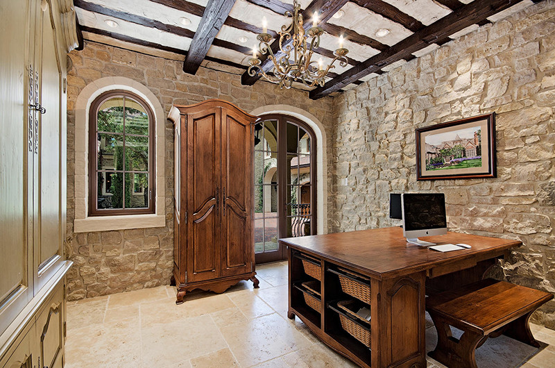 Photo of a large traditional home office in Salt Lake City with dark hardwood floors and a freestanding desk.